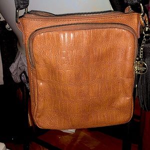 Steve Madden signature cross body embossed messenger bags in tan and black